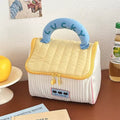 Kawaii makeup bag for kids and teens, featuring house pattern and portable size for travel or school