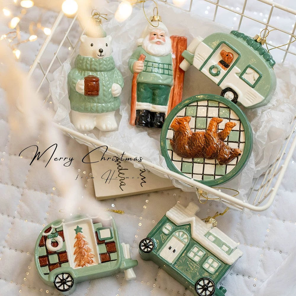 Whimsical Christmas ornaments include two bear designs, skiing Santa and three green camper shapes.