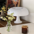 Vintage white mushroom lamp with retro Bauhaus design. Decorative orange light for desks, bedrooms, and living rooms.