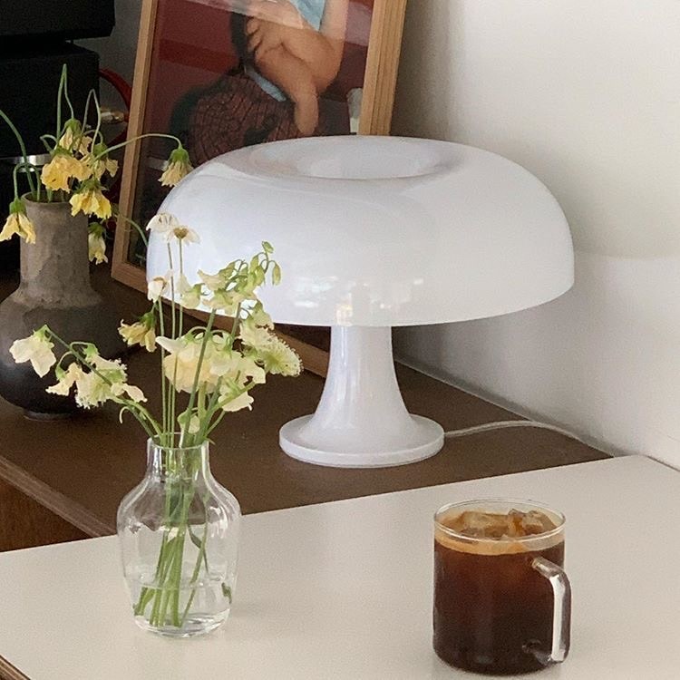 Vintage white mushroom lamp with retro Bauhaus design. Decorative orange light for desks, bedrooms, and living rooms.