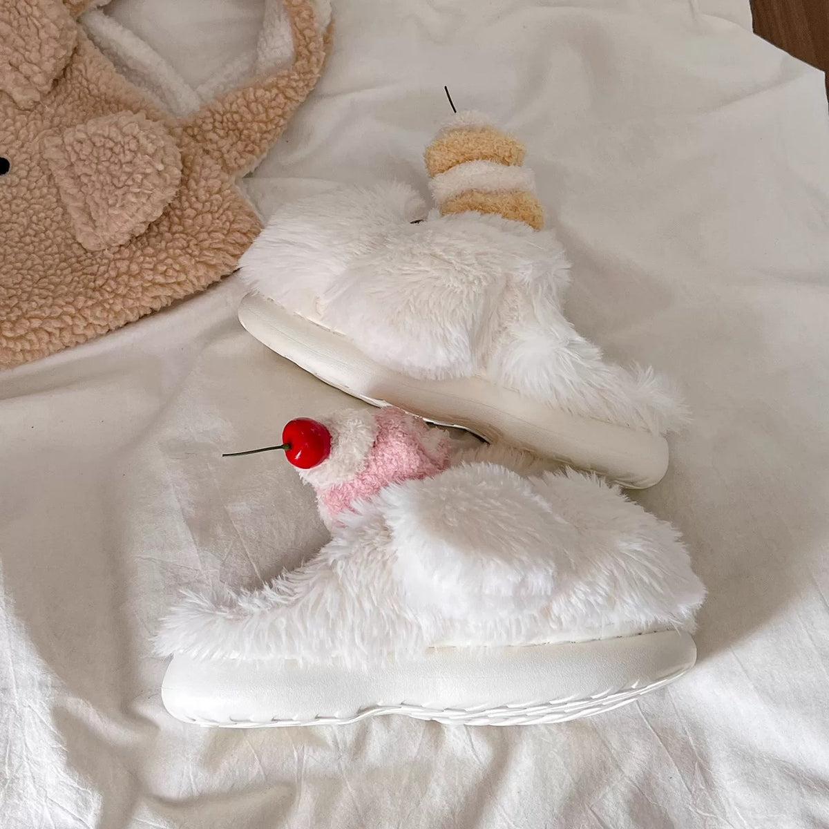 White plush dog slippers with cake and cherry accessories