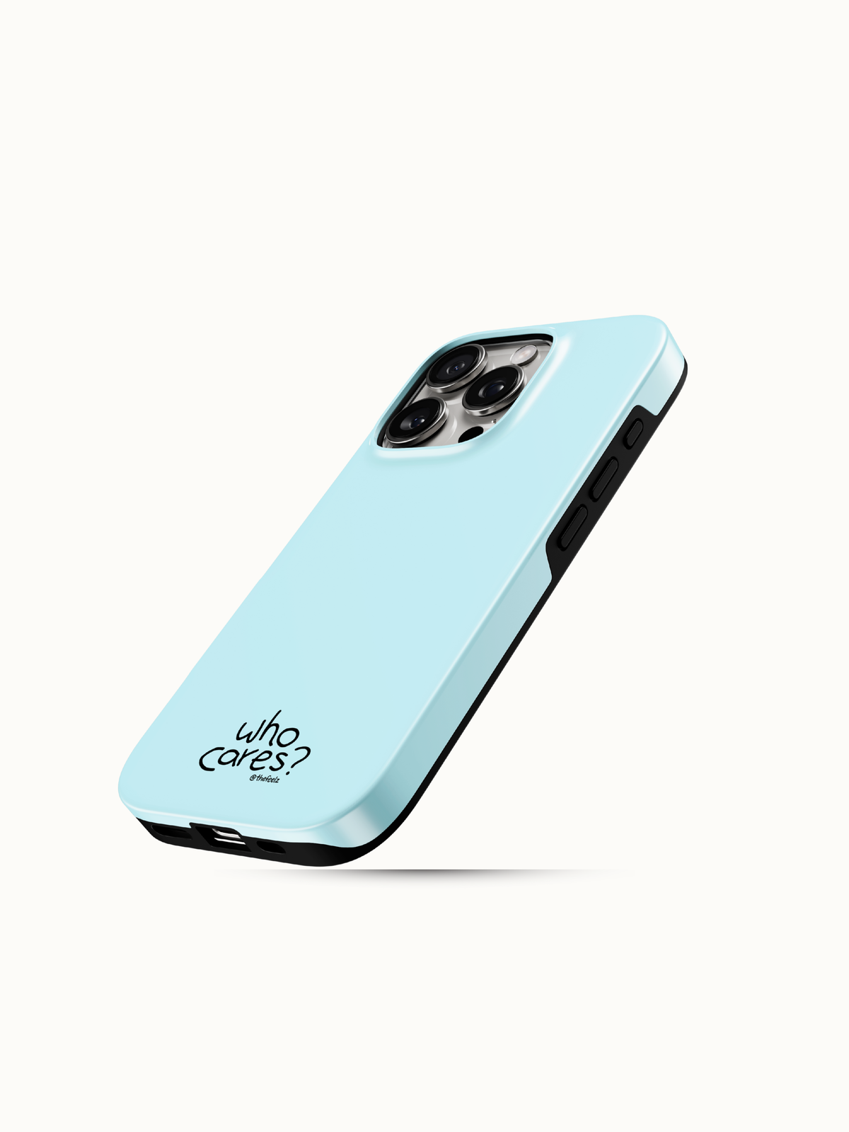 Light blue iPhone case with a tiny black who cares print near the bottom, angled view