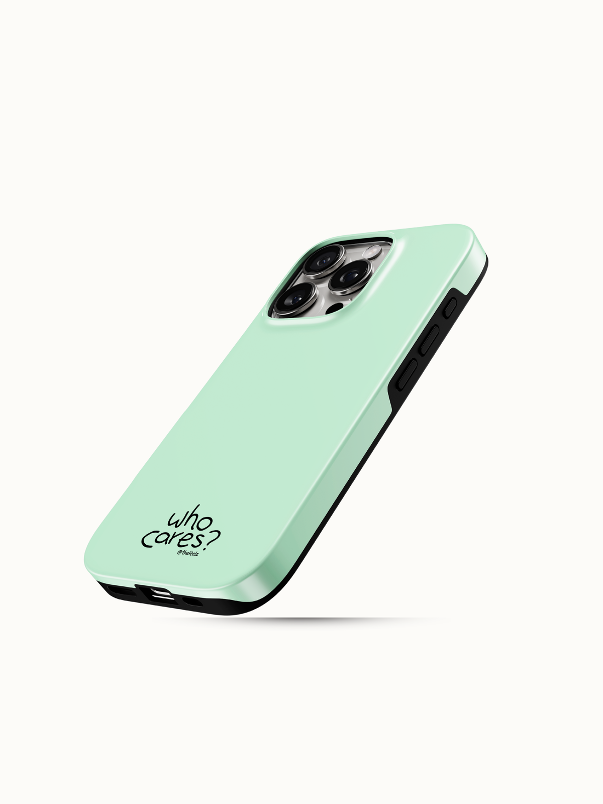 Mint green iPhone case with a tiny black who cares print near the bottom, angled view