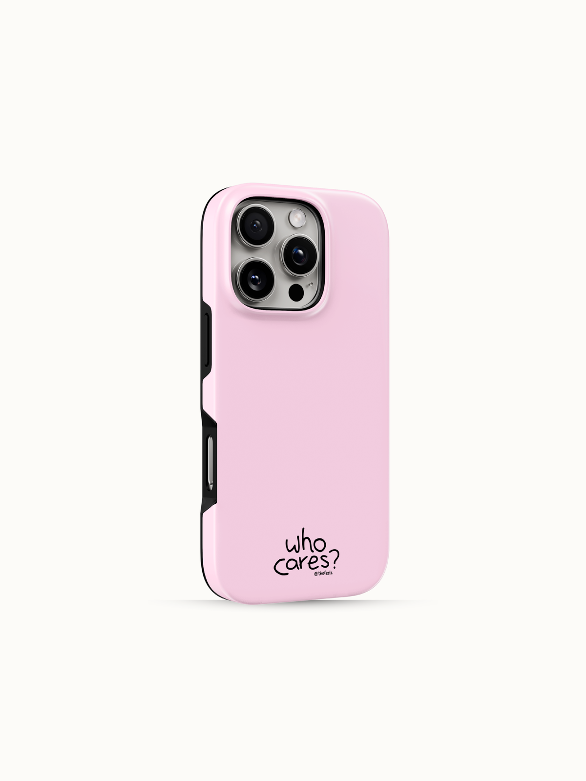 Pastel pink iPhone case with a tiny black who cares print near the bottom, back view with the black side edge