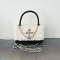 Stylish Y2K gothic handbag with cross applique and plush leather. Perfect grunge crossbody bag for women.