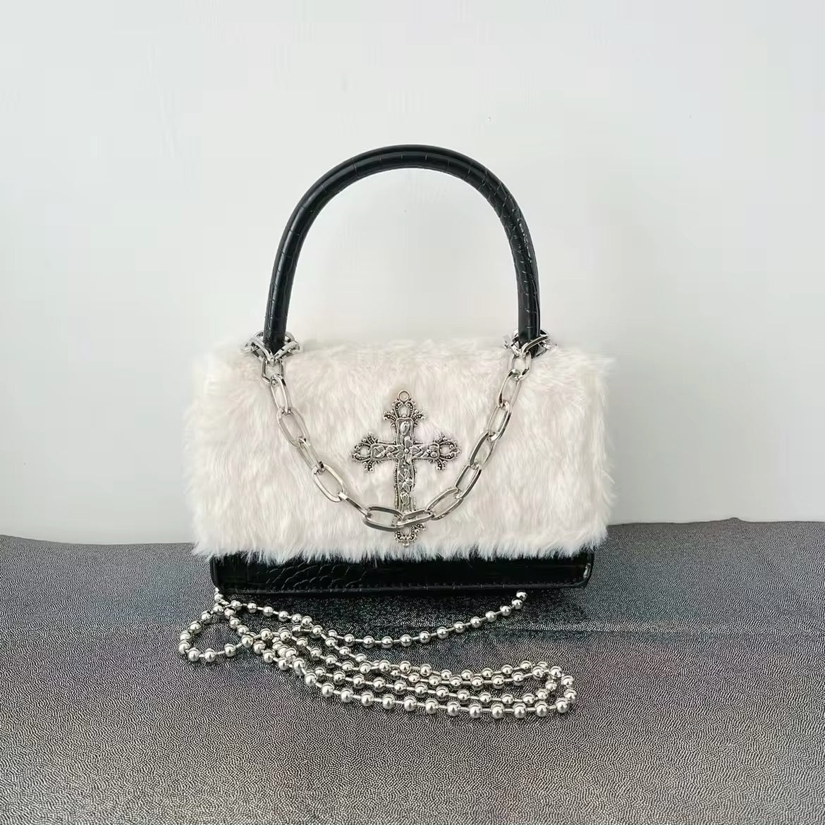 Stylish Y2K gothic handbag with cross applique and plush leather. Perfect grunge crossbody bag for women.