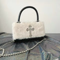 Black gothic handbag with plush leather and chain strap. Y2K aesthetic crossbody bag for women’s Harajuku fashion.