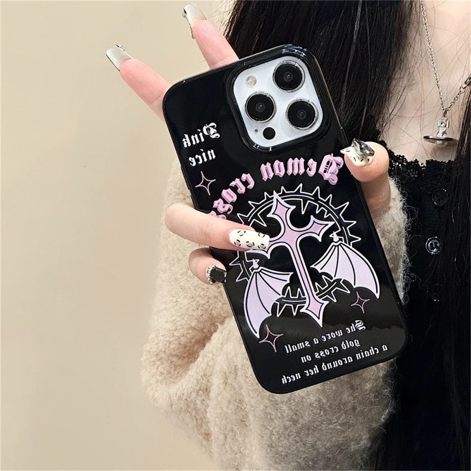 Vintage gothic iPhone case with Y2K grunge design. Black rubber cover with pink wings for iPhone 11, 12, 13, 14, and 15 Pro Max.